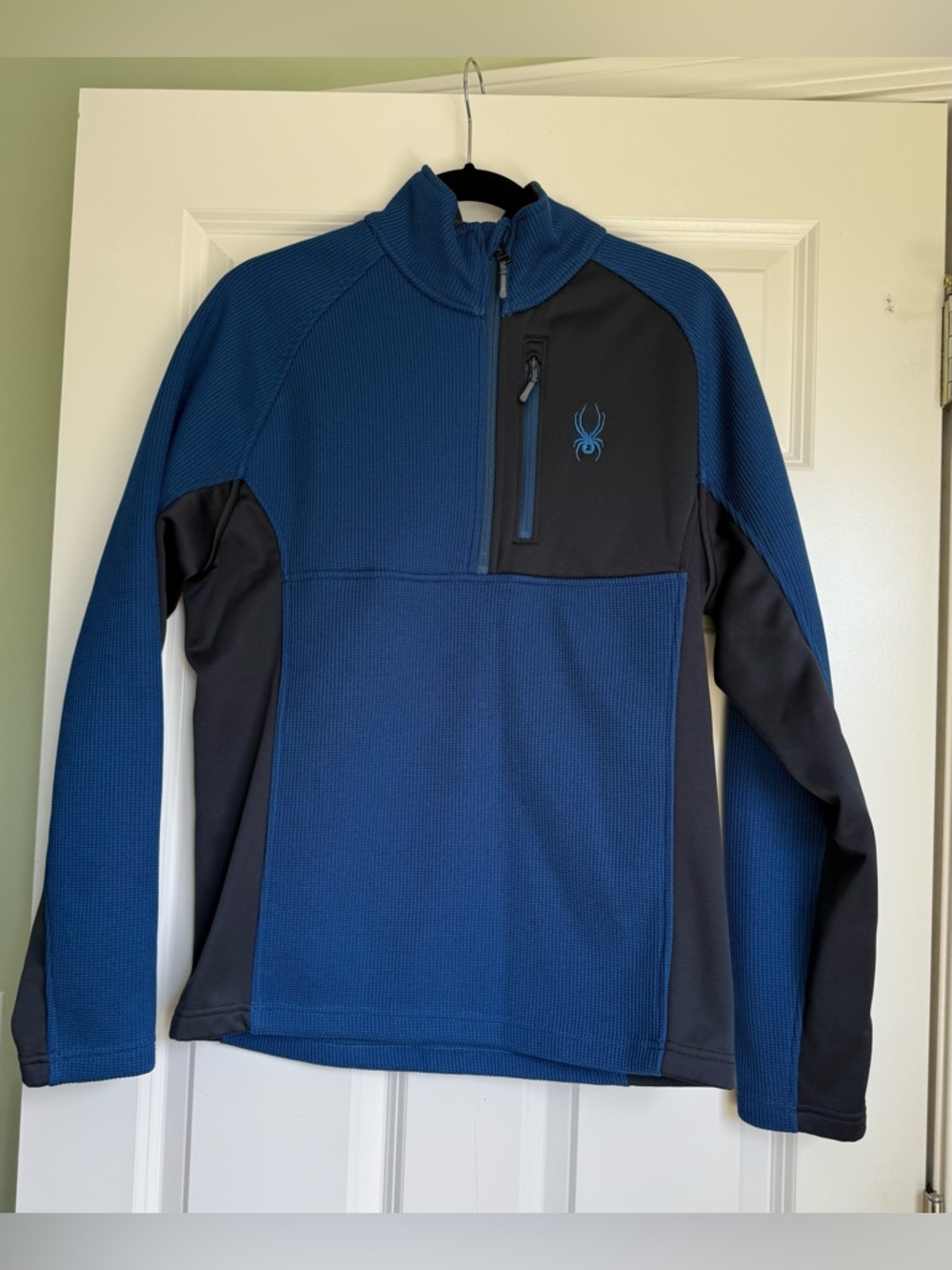 Spyder Men's blue quarter-Zip Performance pullover.